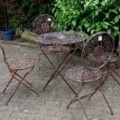 Garten Sitzgruppe aus Eisen verkupfert Tisch 4 Stühle