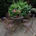 Garten Sitzgruppe aus Eisen verkupfert Tisch 4 Stühle